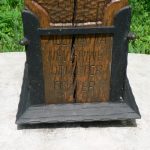 Carved wood monument