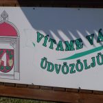 Welcome board with coat of arms
